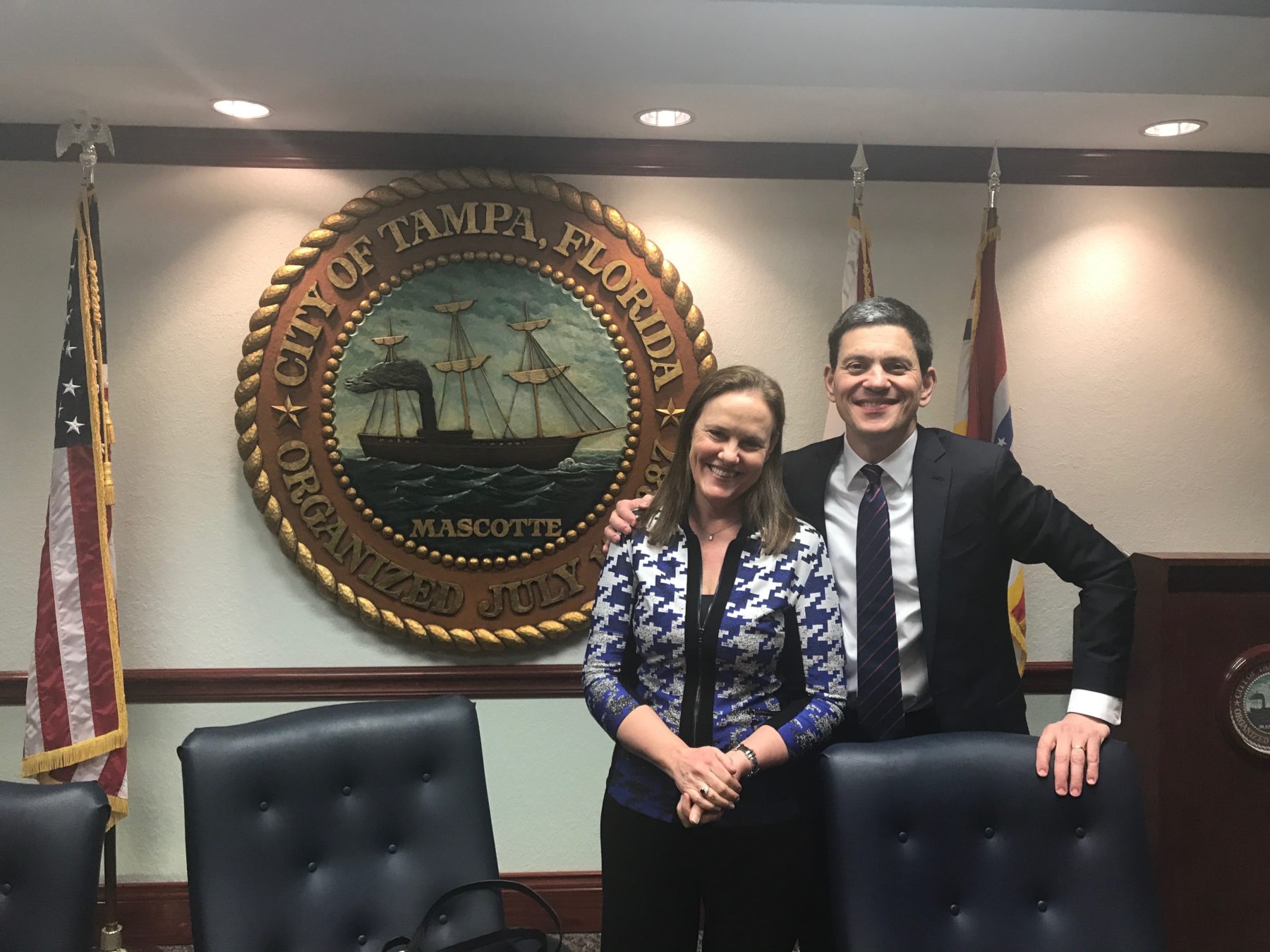 The Honorable Michèle Flournoy and the Rt. Hon. David Miliband pose for a picture in the office of the Mayor of Tampa 