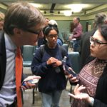 Ambassador Peter Wittig visits with a student from Tampa, Florida